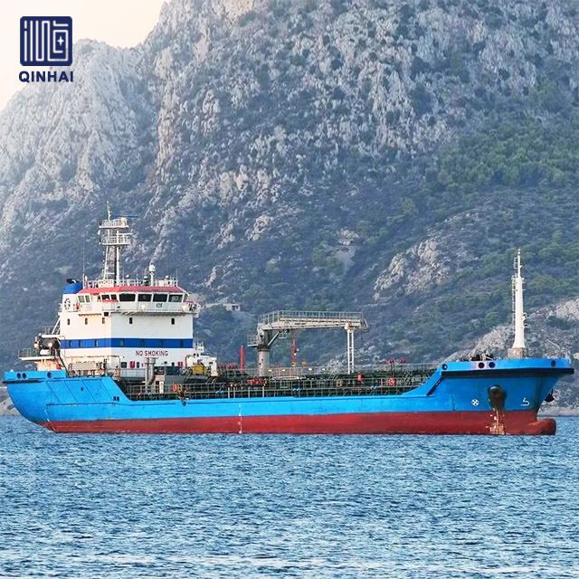 Small oil tanker navigating coastal waters