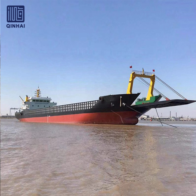 Commercial vessel under construction at shipyard showing class society inspection process